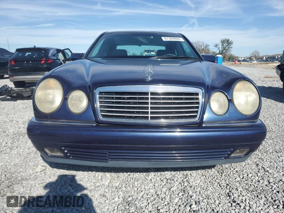1998 Mercedes-Benz E-Class with VIN WDBJF65F3WA642006, listed as a Copart auction lot 87309994 with 129,837 mi miles and Salvage Title. Bid and sale history available at carsss.com. Image 5.