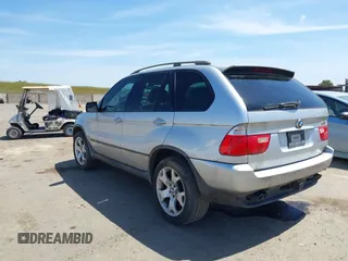 2001 BMW X5 4.4i with VIN WBAFB33511LH18797, listed as a IAAI auction lot 42075328 with 169,396 mi miles. Bid and sale history available at carsss.com. Image 3.