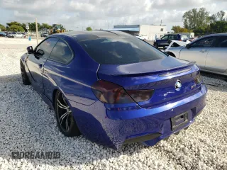 2013 BMW M6 z VIN WBSLX9C56DD159858, wystawiony jako Copart lot #36140122 z przebiegiem 70 246 mil mil oraz Szkoda całkowita • Salvage title. Historia ofert i sprzedaży dostępna na DreamBid. Obrazek 3.