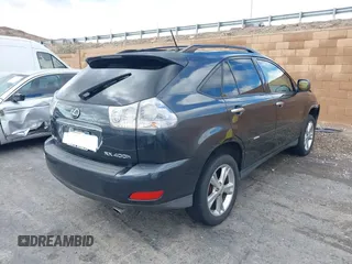 2008 Lexus RX 400h with VIN JTJGW31U382850234, listed as a IAAI auction lot 41556774 with 124,697 mi miles and . Bid and sale history available at DreamBid. Image 4.