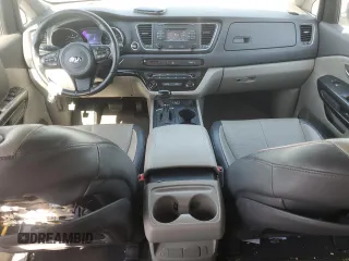2017 Kia Sedona LX with VIN KNDMB5C14H6237144, listed as a Copart auction lot 51140465 with 128,356 mi miles and Salvage Title. Bid and sale history available at carsss.com. Image 8.