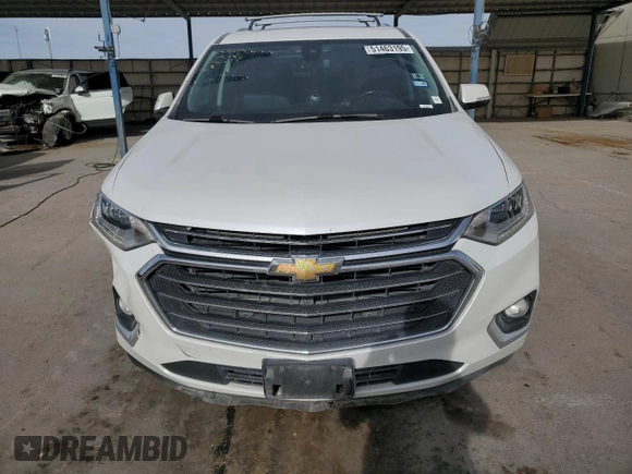 2019 Chevrolet Traverse Premier with VIN 1GNERKKW3KJ147054, listed as a Copart auction lot 59191225 with 112,436 mi miles and Salvage title. Bid and sale history available at DreamBid. Image 5.