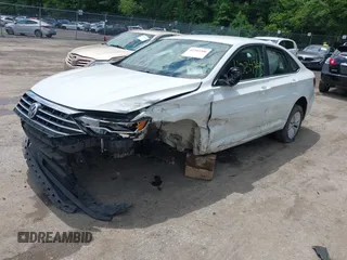 2019 Volkswagen Jetta S with VIN 3VWC57BU6KM267969, listed as a IAAI auction lot 42342206 with 77,029 mi miles and . Bid and sale history available at DreamBid. Image 2.