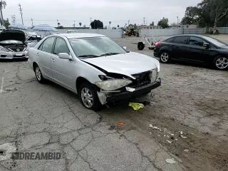 2005 Toyota Camry LE with VIN 4T1BF32KX5U601192, listed as a Copart auction lot 55365485 with 153,251 mi miles and Salvage Title. Bid and sale history available at DreamBid. Image 14.