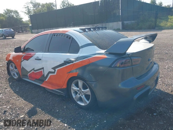 2014 Mitsubishi Lancer GT with VIN JA32U8FW6EU015415, listed as a IAAI auction lot 40171318 with 40,000 mi miles. Bid and sale history available at carsss.com. Image 3.