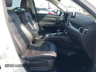 2017 Mazda CX-5 Grand Touring with VIN JM3KFADLXH0222341, listed as a IAAI auction lot 41990464 with 94,374 mi miles and . Bid and sale history available at carsss.com. Image 5.