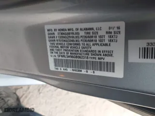2016 Honda Odyssey Touring Elite with VIN 5FNRL5H96GB062318, listed as a IAAI auction lot 41660493 with 137,269 mi miles. Bid and sale history available at carsss.com. Image 9.