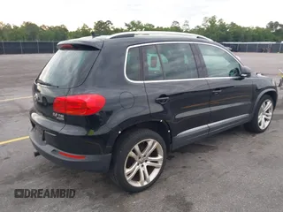2012 Volkswagen Tiguan S with VIN WVGBV7AX6CW592242, listed as a IAAI auction lot 42215240 with 158,852 mi miles and . Bid and sale history available at DreamBid. Image 4.