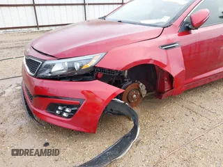 2014 Kia Optima EX z VIN 5XXGN4A76EG281195, wystawiony jako IAAI lot #41875540 z przebiegiem 131 751 mil mil oraz . Historia ofert i sprzedaży dostępna na DreamBid. Obrazek 6.
