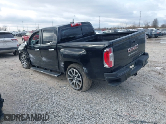 2021 GMC Canyon 4WD Denali with VIN 1GTG6EEN9M1221529, listed as a IAAI auction lot 41228498 with 67,727 mi miles. Bid and sale history available at carsss.com. Image 3.