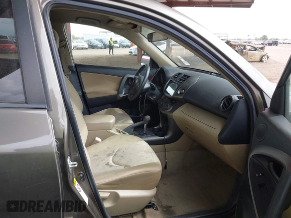 2009 Toyota RAV4 with VIN JTMBK33V895074715, listed as a IAAI auction lot 41802446 with 215,892 mi miles. Bid and sale history available at carsss.com. Image 5.