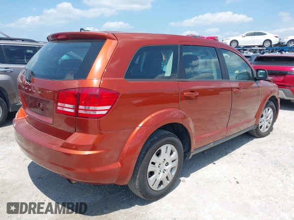 2014 Dodge Journey American Value Pkg with VIN 3C4PDCAB6ET248820, listed as a IAAI auction lot 39159166 with 215,007 mi miles. Bid and sale history available at carsss.com. Image 4.