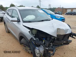 2016 Hyundai Tucson SE z VIN KM8J33A48GU116852, wystawiony jako IAAI lot #42111656 z przebiegiem 138 656 mil mil oraz . Historia ofert i sprzedaży dostępna na DreamBid. Obrazek 1.
