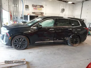 2022 Cadillac XT6 Premium Luxury z VIN 1GYKPDRS0NZ131233, wystawiony jako IAAI lot #41600244 z przebiegiem 112 258 mil mil oraz . Historia ofert i sprzedaży dostępna na DreamBid. Obrazek 14.