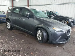2016 Mazda CX-3 Sport with VIN JM1DKFB70G0130573, listed as a IAAI auction lot 41393339 with 98,669 mi miles. Bid and sale history available at carsss.com. Image 1.