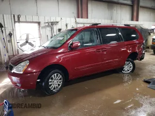 2012 Kia Sedona LX with VIN KNDMG4C71C6432577, listed as a Copart auction lot 49298405 with 205,983 mi miles and Salvage Title. Bid and sale history available at carsss.com. Image 1.