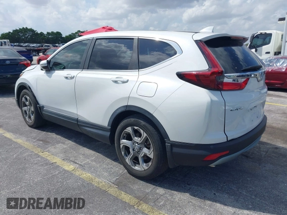 2019 Honda CR-V EX with VIN 5J6RW1H51KA007719, listed as a IAAI auction lot 41985574 with 58,696 mi miles. Bid and sale history available at carsss.com. Image 3.