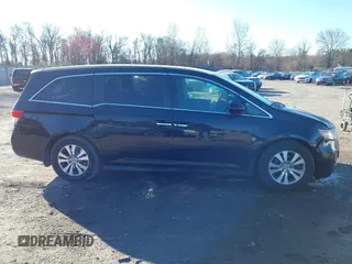 2017 Honda Odyssey SE with VIN 5FNRL5H31HB020510, listed as a IAAI auction lot 41877937 with 105,690 mi miles and . Bid and sale history available at carsss.com. Image 13.