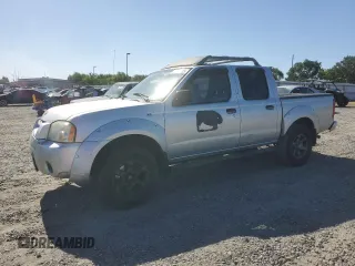 2004 Nissan Frontier LE z VIN 1N6ED27T04C452859, wystawiony jako Copart lot #57729385 z przebiegiem 213 268 mil mil oraz Czysty tytuł • Clean title. Historia ofert i sprzedaży dostępna na DreamBid. Obrazek 1.