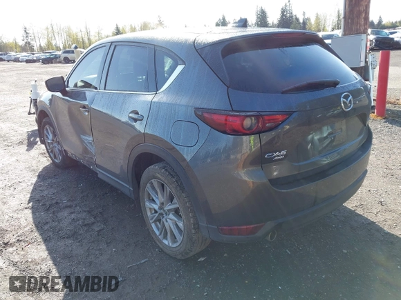 2019 Mazda CX-5 Grand Touring with VIN JM3KFBDM3K1677208, listed as a IAAI auction lot 41929299 with 58,163 mi miles. Bid and sale history available at carsss.com. Image 3.