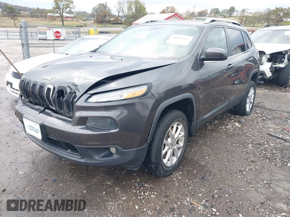 2014 Jeep Cherokee Altitude with VIN 1C4PJMCB7EW232678, listed as a IAAI auction lot 40812147 with 105,828 mi miles. Bid and sale history available at carsss.com. Image 18.