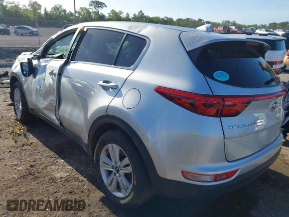 2019 Kia Sportage LX with VIN KNDPM3AC8K7591055, listed as a IAAI auction lot 41962190 with 74,003 mi miles. Bid and sale history available at carsss.com. Image 3.