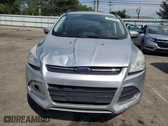 2014 Ford Escape SE with VIN 1FMCU9GX3EUB19987, listed as a Copart auction lot 64042695 with 96,775 mi miles and Salvage title. Bid and sale history available at DreamBid. Image 5.