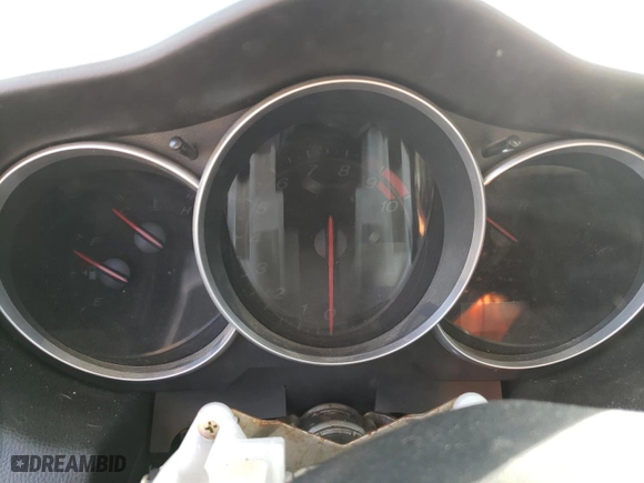 2005 Mazda RX-8 with VIN JM1FE173650147951, listed as a Copart auction lot 76422174 with 0 mi miles and Salvage Title. Bid and sale history available at carsss.com. Image 9.