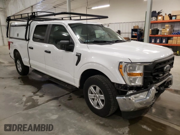 2021 Ford F-150 XL with VIN 1FTFW1E8XMKE65151, listed as a Copart auction lot 52579095 with 77,927 mi miles and Salvage Title. Bid and sale history available at carsss.com. Image 4.