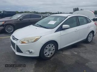 2012 Ford Focus SE with VIN 1FAHP3F25CL239383, listed as a IAAI auction lot 41656033 with 127,011 mi miles and . Bid and sale history available at DreamBid. Image 2.