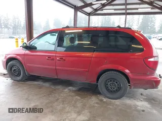 2005 Dodge Caravan SXT with VIN 2D4GP44LX5R210076, listed as a IAAI auction lot 41856927 with 291,712 mi miles and . Bid and sale history available at carsss.com. Image 14.