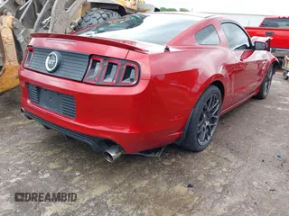 2013 Ford Mustang GT with VIN 1ZVBP8CF5D5209257, listed as a IAAI auction lot 42141198 with 124,462 mi miles and . Bid and sale history available at DreamBid. Image 4.