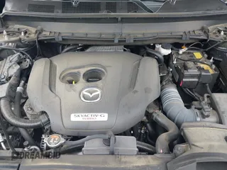 2022 Mazda CX-9 Touring Plus z VIN JM3TCBAY2N0619279, wystawiony jako IAAI lot #42373722 z przebiegiem 43 540 mil mil oraz . Historia ofert i sprzedaży dostępna na DreamBid. Obrazek 10.