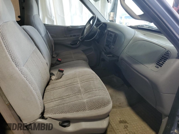 1997 Ford F-150 with VIN 1FTDX076XVKC72073, listed as a Copart auction lot 62774955 with 204,105 mi miles and Salvage title. Bid and sale history available at DreamBid. Image 7.
