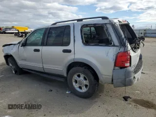 2002 Ford Explorer XLS with VIN 1FMZU72E02UA28983, listed as a Copart auction lot 56871915 with Not provided miles and Salvage title. Bid and sale history available at DreamBid. Image 2.
