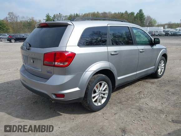 2015 Dodge Journey SXT with VIN 3C4PDDBG4FT554643, listed as a IAAI auction lot 42172378 with 144,924 mi miles and . Bid and sale history available at DreamBid. Image 4.