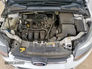 2014 Ford Focus SE z VIN 1FADP3K24EL187042, wystawiony jako Copart lot #57636395 z przebiegiem 105 918 mil mil oraz Szkoda całkowita • Salvage title. Historia ofert i sprzedaży dostępna na DreamBid. Obrazek 11.