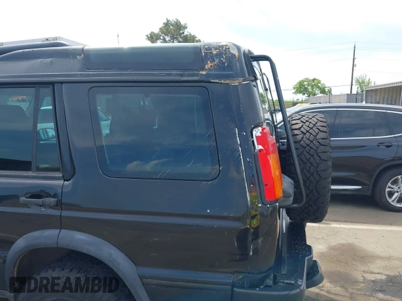 2004 Land Rover Discovery SE with VIN SALTW19464A860565, listed as a IAAI auction lot 42019860 with 153,274 mi miles. Bid and sale history available at carsss.com. Image 20.