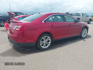 2014 Ford Taurus SHO with VIN 1FAHP2KT1EG133940, listed as a IAAI auction lot 42805214 with 141,204 mi miles and . Bid and sale history available at DreamBid. Image 4.