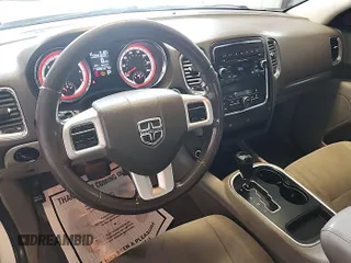 2013 Dodge Durango SXT with VIN 1C4RDJAG8DC671689, listed as a IAAI auction lot 42743958 with 160,950 mi miles and . Bid and sale history available at DreamBid. Image 24.