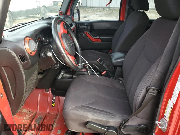2014 Jeep Wrangler Unlimited Sport with VIN 1C4HJWDG6EL280653, listed as a Copart auction lot 48851205 with 125,211 mi miles and Salvage Title. Bid and sale history available at DreamBid. Image 7.