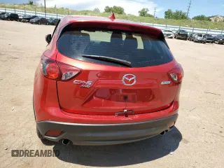 2016 Mazda CX-5 Sport with VIN JM3KE4BYXG0702655, listed as a Copart auction lot 63120205 with 64,403 mi miles and Salvage title. Bid and sale history available at DreamBid. Image 6.