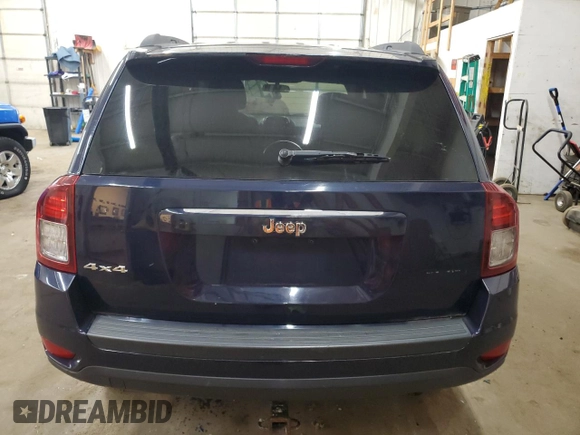 2014 Jeep Compass Sport with VIN 1C4NJDBB0ED598518, listed as a Copart auction lot 55072665 with 128,141 mi miles and Salvage Title. Bid and sale history available at carsss.com. Image 6.