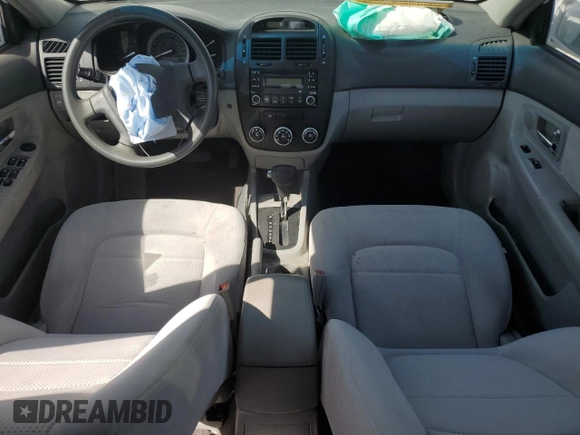 2007 Kia Spectra EX with VIN KNAFE121775460533, listed as a Copart auction lot 50873075 with 116,433 mi miles and Salvage Title. Bid and sale history available at carsss.com. Image 8.