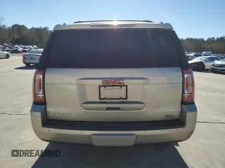 2015 GMC Yukon SLT with VIN 1GKS1BKC7FR120802, listed as a Copart auction lot 87430984 with 191,829 mi miles and Salvage Title. Bid and sale history available at carsss.com. Image 6.