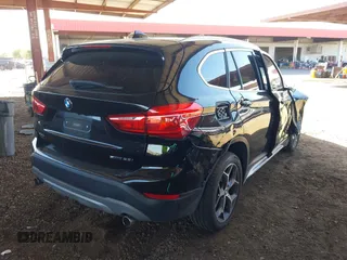 2018 BMW X1 sDrive28i z VIN WBXHU7C35J5L06673, wystawiony jako IAAI lot #42275787 z przebiegiem 61 204 mil mil oraz . Historia ofert i sprzedaży dostępna na DreamBid. Obrazek 4.