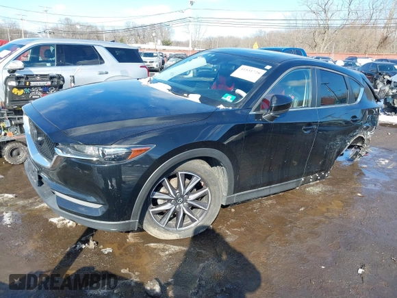 2018 Mazda CX-5 Touring with VIN JM3KFBCM2J0451828, listed as a IAAI auction lot 41531728 with 88,939 mi miles. Bid and sale history available at carsss.com. Image 2.