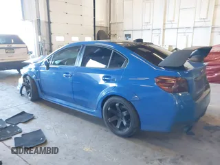 2018 Subaru WRX Premium with VIN JF1VA1C67J9809636, listed as a IAAI auction lot 41557758 with 102,390 mi miles. Bid and sale history available at carsss.com. Image 3.