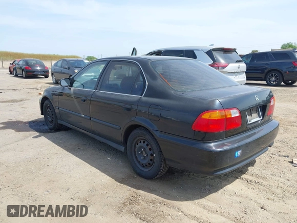 1999 Honda Civic LX with VIN JHMEJ6674XS003829, listed as a IAAI auction lot 42121298 with 238,936 mi miles. Bid and sale history available at carsss.com. Image 3.