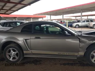 2002 Ford Mustang Standard z VIN 1FAFP40482F157569, wystawiony jako IAAI lot #42372535 z przebiegiem 76 944 mil mil oraz . Historia ofert i sprzedaży dostępna na DreamBid. Obrazek 13.